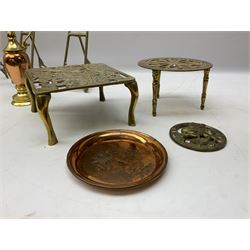 Ornate brass inkstand with ceramic inkwell, W11cm, together with another similar of rectangular form, heavy copper and brass miniature ewer with serpent handle Reg 929830, three miniature brass picture easels, together with other brass and copper metal ware