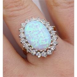 Silver-gilt oval opal and cubic zirconia ring, stamped Sil