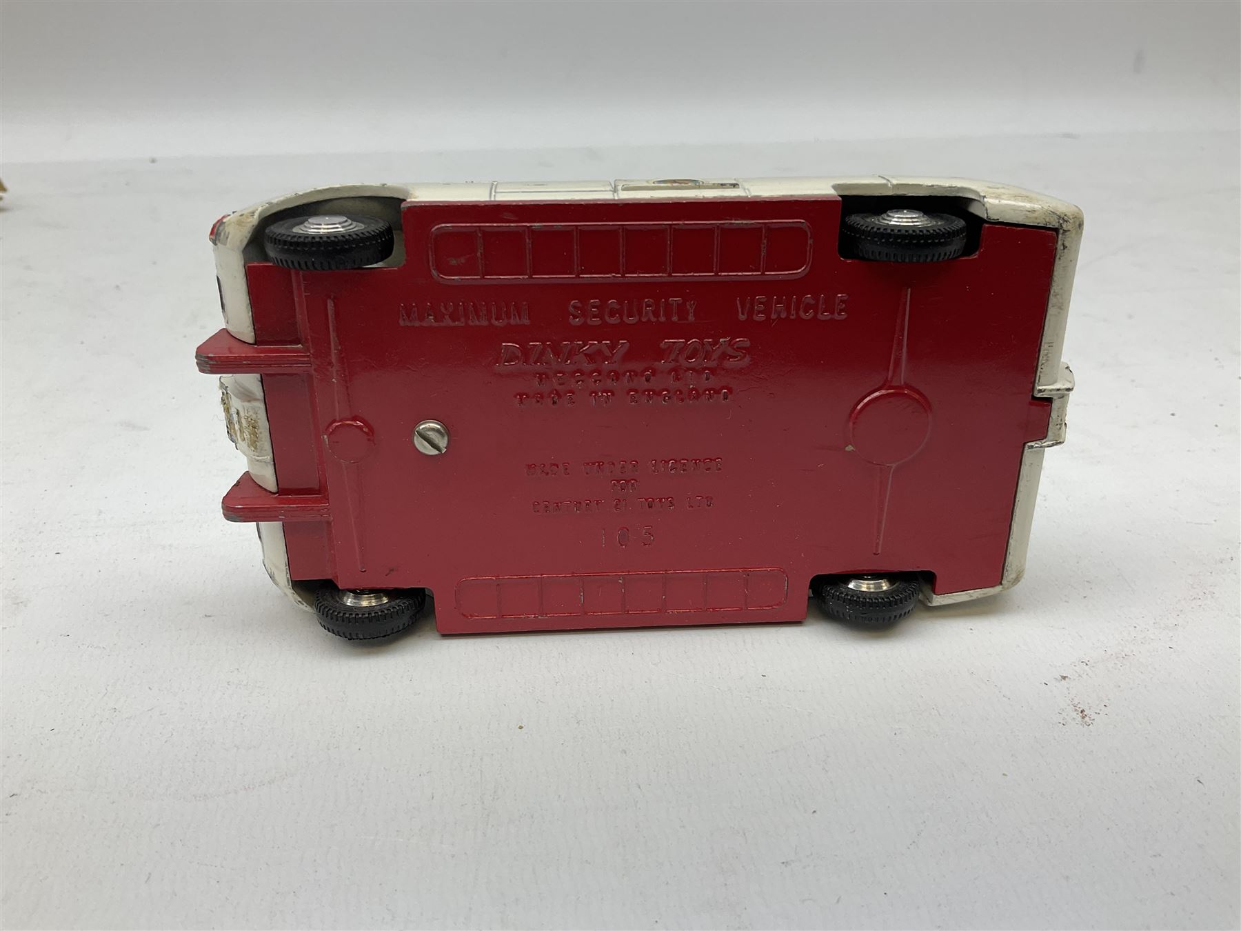 Dinky - Captain Scarlet and the Mysterons Maximum Security Vehicle with crate No.105; Airport Fire Tender with Flashing Light; and Michigan 180-III Tractor Dozer No.976; all boxed (3)