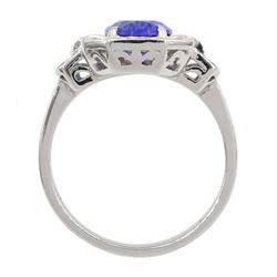 18ct gold oval tanzanite, round and baguette cut diamond cluster ring, stamped 750, tanzanite approx 1.85 carat, total diamond weight approx 0.70 carat