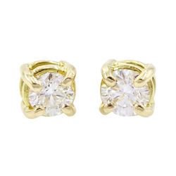 Pair of 18ct gold single stone round brilliant cut diamond stud earrings, total diamond weight approx 0.65 carat