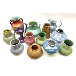 A group of Candy Ware vases, of various form and design with varied glazes including streaked high fired and eggshell, plus a small number of unmarked examples. 