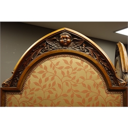  Late Victorian walnut framed four panel upholstered dressing screen, Gothic pointed arch cresting carved with winged cherub heads and foliage, H186cm, W224cm  