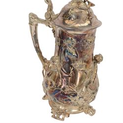 Large late 19th/early 20th century WMF Art Nouveau silver plated stein or jug, circa 1900, the bellied body cast and applied with Bacchanalian figures, the domed cover with putti finial, and handle modelled as a vine, the whole upon four fruit and leaf mounted feet, marked beneath for WMF and engraved with initials CHE and dated 1911, H40.5cm
