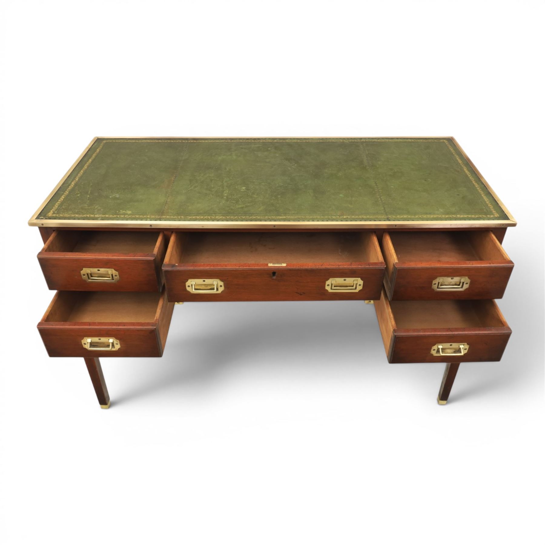 Military campaign style mahogany writing desk, inset gilt-tooled green leather writing surface, fitted with five drawers with recessed brass handles, brass corner mounts and protective bindings, on square tapering legs
