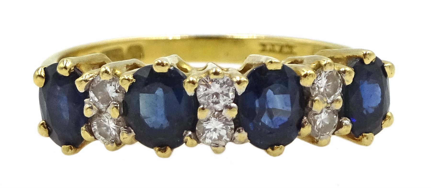 18ct gold four stone oval sapphire and six stone diamond ring, London 1981