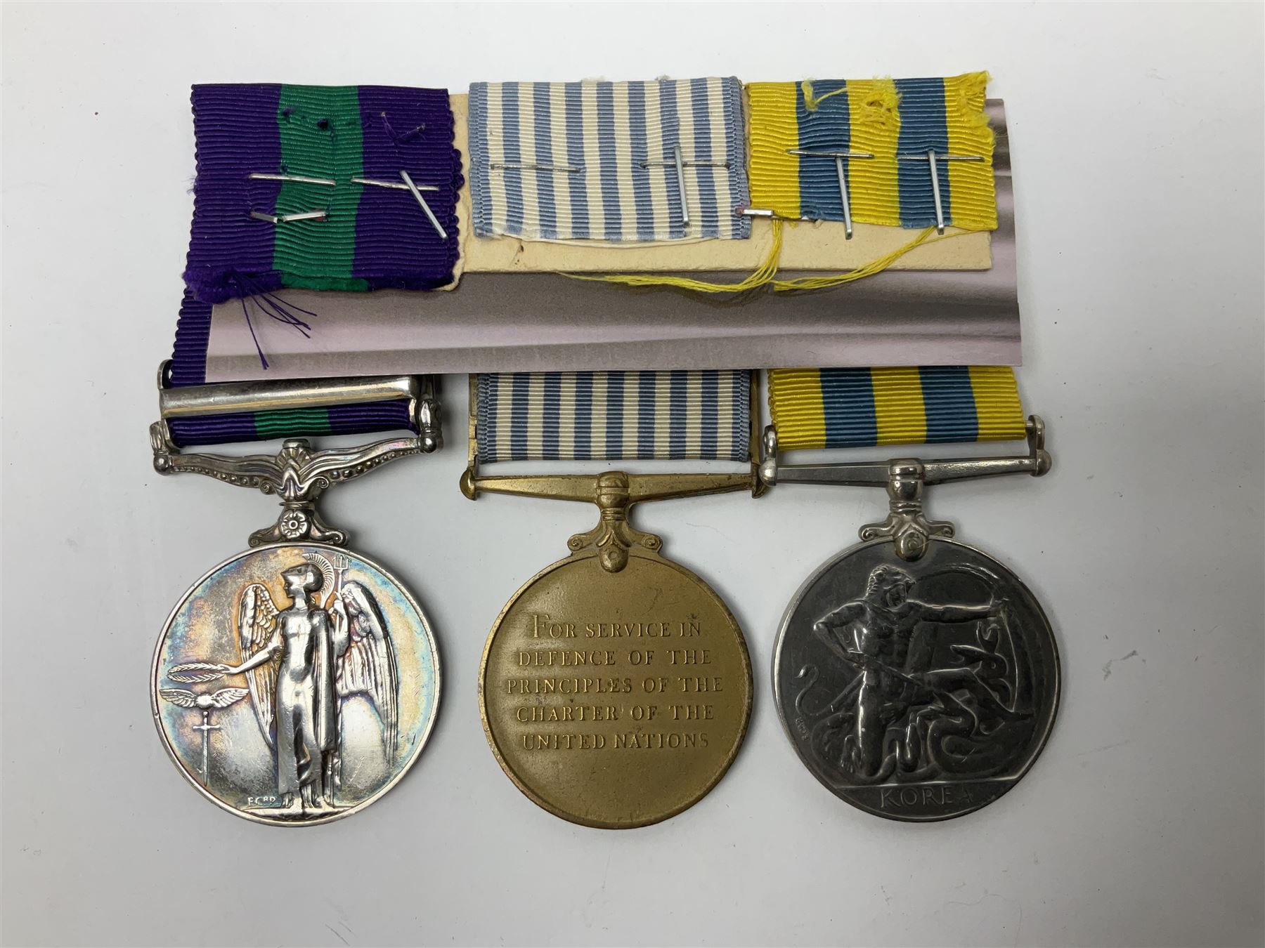 Korean War group of three medals comprising ERII Korea Medal awarded to 22307852 Pte. M. McGill R.A.M.C., UN Korea Medal and ERII General Service Medal with Malaya clasp to 22307852 Cpl. M. McGill R.A.M.C.