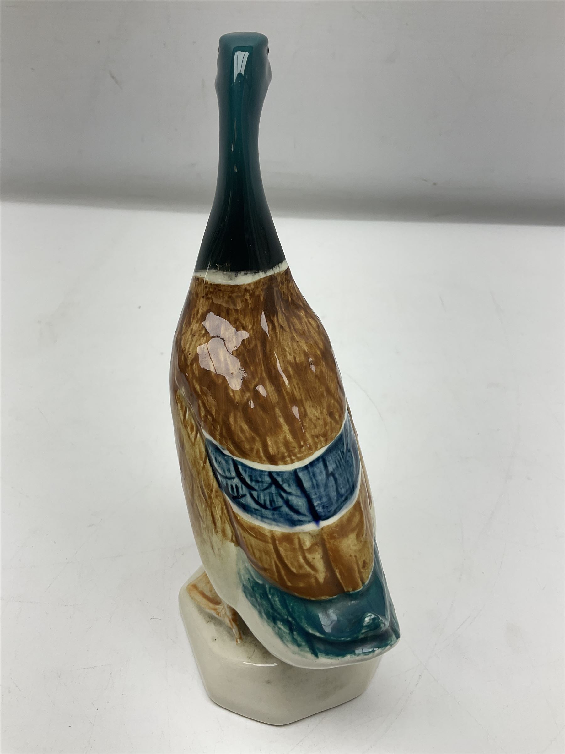 Beswick Champion of Champions Hereford bull figure no 1360, Beswick Norman Thelwell An Angel on Horseback no 2704A, and three other Beswick figures to include Arab Bay horse, Mallard and Comical Duck Family, all with printed or impressed marks beneath, largest H17.5cm