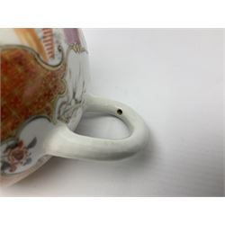 Two late 18th/early 19th century Chinese export teapots, the largest example of globular form with curved handle and straight spout, decorated in the Mandarin style with figural scenes surrounded by red scale reserves, H13.5cm, the second smaller example decorated in underglaze blue with two musicians in a landscape set with willow tree and fence, H10.5cm

