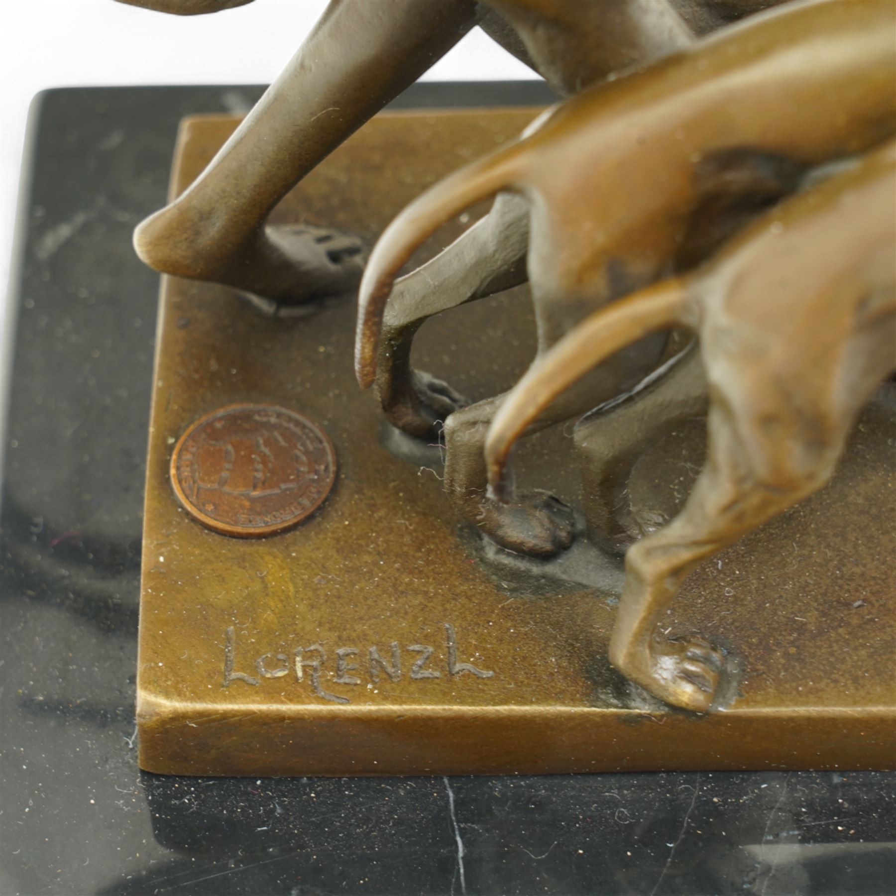 After Lorenzl - Art Deco style bronze group 'Spring Frolic', with foundry mark on rectangular marble base 23cm x 23cm