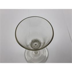 18th century wine glass, the trumpet shaped bowl upon tear drop stem and conical folded foot, H15.5cm, together with an 18th century cordial glass, the round funnel bowl on plain knopped stem and folded conical foot