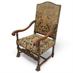 Baroque design walnut framed open armchair, arched cresting rail over acanthus carved shap...