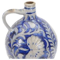 19th century German salt glazed flagon, decorated with foliage and floral sprigs, H36cm