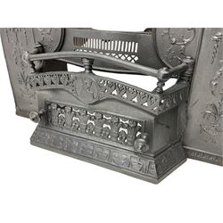 Georgian cast iron fire hob grate, with Adam style decoration, together with a Victorian cast iron fire front, decorated with Britannia and Prince of Wales's feather motifs 