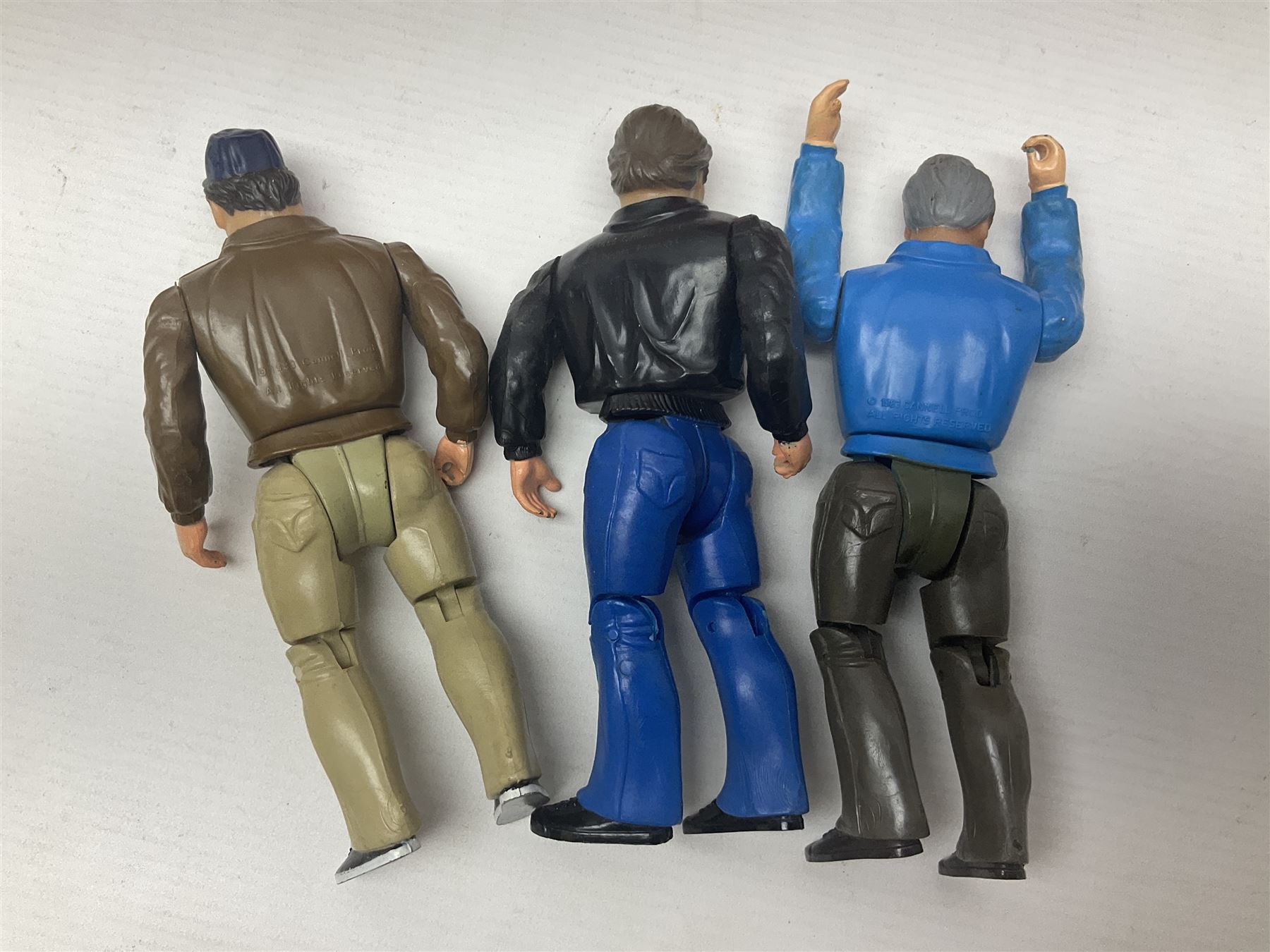 Pelham Puppet - Tyrolean Girl in yellow box; three 'A' Team action figures; clockwork plastic Mickey Mouse figure; and seven various fashion dolls (12)