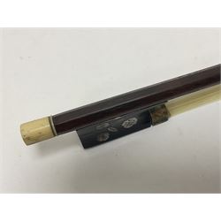 19th century wooden violin bow with a decorative mother of pearl inlay depicting flowers to the frog, with a bone adjuster screw