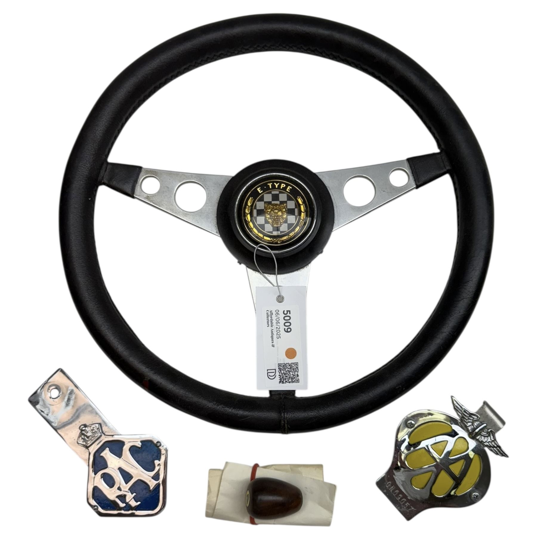 Steering wheel with E-Type Jaguar badge, AA badge, RAC badge and Lotus gearstick top