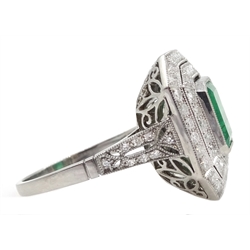 Platinum emerald and double row diamond ring, with diamond set shoulders, emerald approx 1.85 carat, total diamond weight 1.20 carat