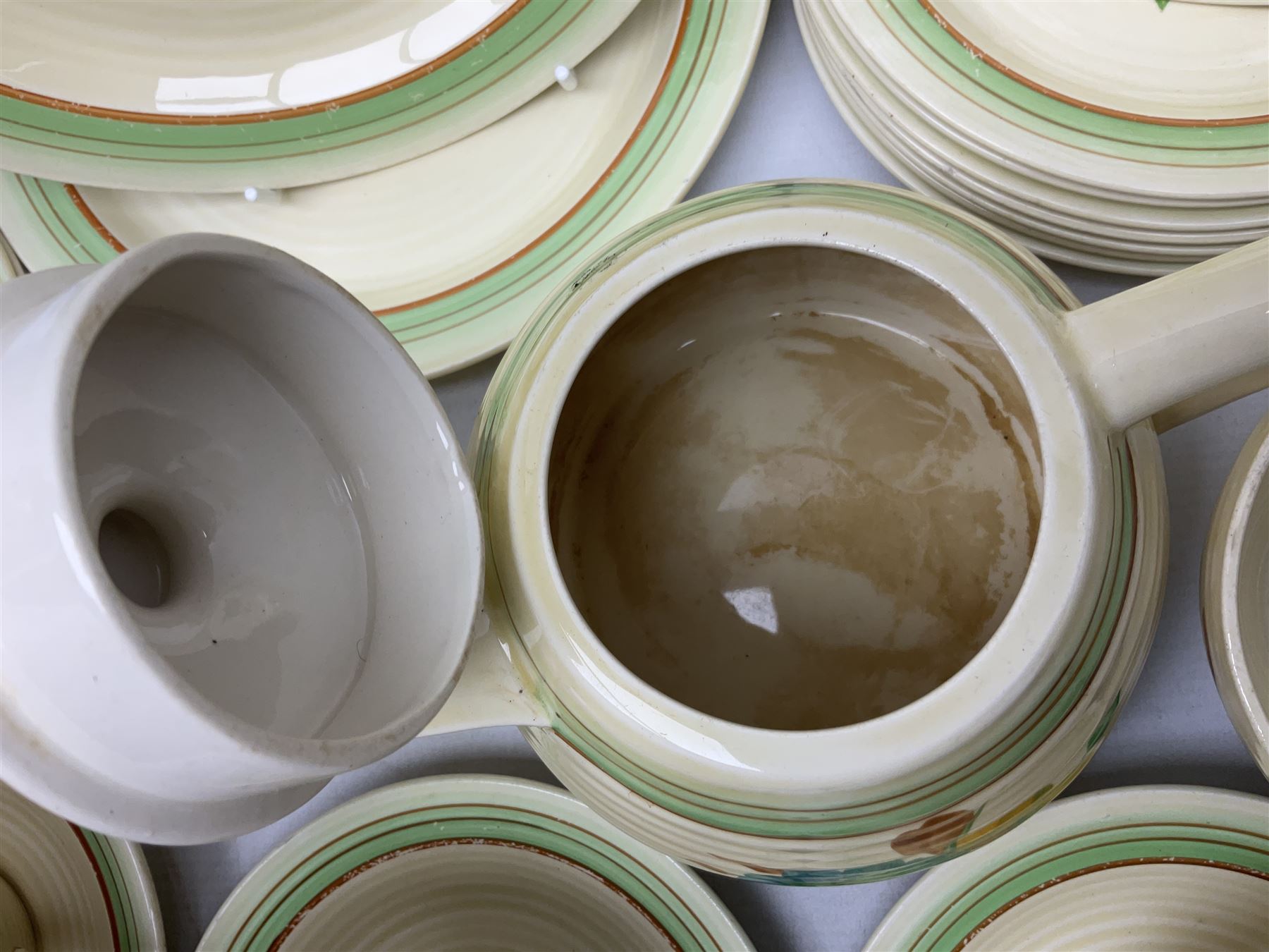 Wilkinson Clarice Cliff honeydew pattern tea service for eight, comprising teapot, milk jug, open sucrier, teacup and saucers, dessert plates and two side plates (29)