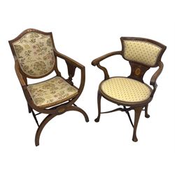 Edwardian inlaid mahogany X-frame armchair, upholstered seat and shield-back, curved front supports united by turned H-stretcher (W57cm, D58cm, H94cm); similar inlaid mahogany armchair, raised on cabriole supports united by cross-stretcher (W62cm, D60cm, H82cm) 