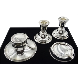  Pair of silver dwarf candlesticks by Sanders & Mackenzie Birmingham 1960 8cm, silver capstan inkwell and a silver ashtray all weighted  