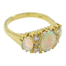 18ct gold three stone opal and six stone old cut diamond ring, hallmarked