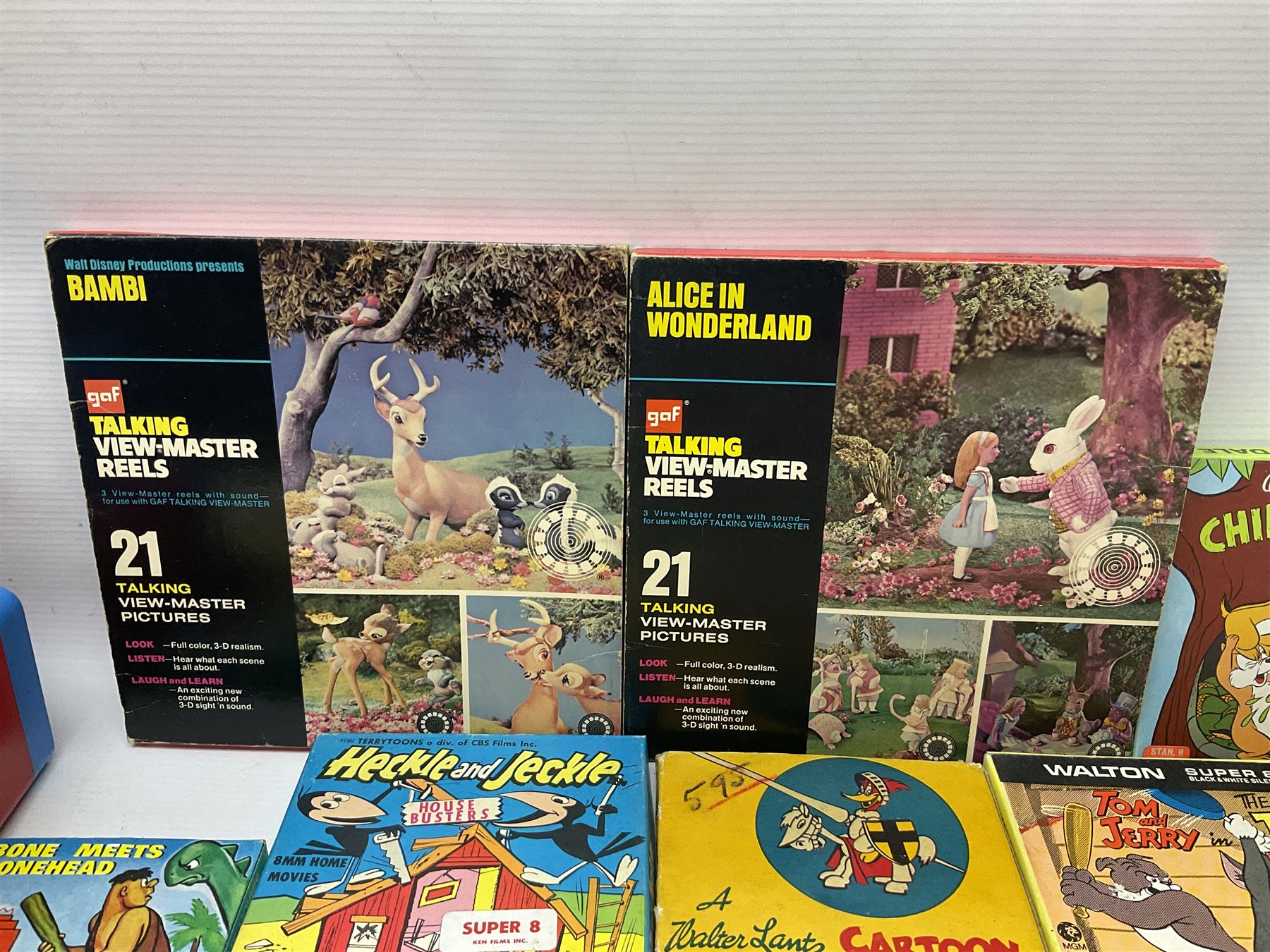 Corgi/Disney - Movie Vision, in original box, with Corgi projector, two Corgi Movie Viewers and nine films; together with 8mm film reels and strips to include Disney’s Dumbo, Mickey Mouse, Alice in Wonderland etc, most in original boxes