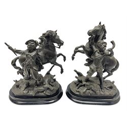 Pair of spelter figural statues of man in period dress, holding rearing horse, upon wooden bases with bun feet, H38cm