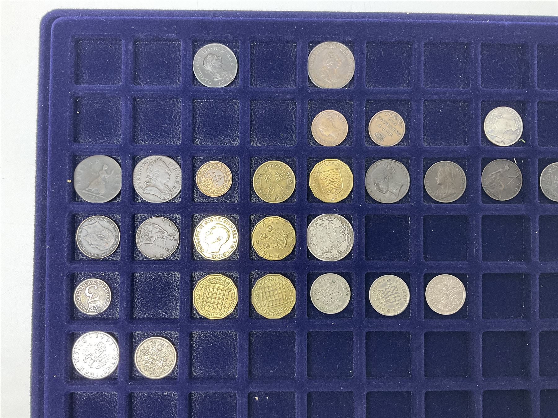 Commemorative, fantasy and other coinage, including George II 1754 farthing, George III 1773 farthing, cartwheel penny and cartwheel two pence, Queen Victoria Canada 1886 twenty five cents, various commemorative crowns etc, housed in three blue coin trays