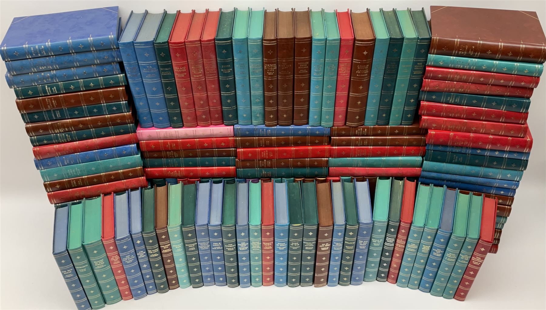 The Companion Book Club London, approximately one hundred thirty hardback novels, various titles including, Blood Sport by Dick Francis, Nemesis by Agatha Christie, The Eye of The Tiger by Wilbur Smith, etc. 