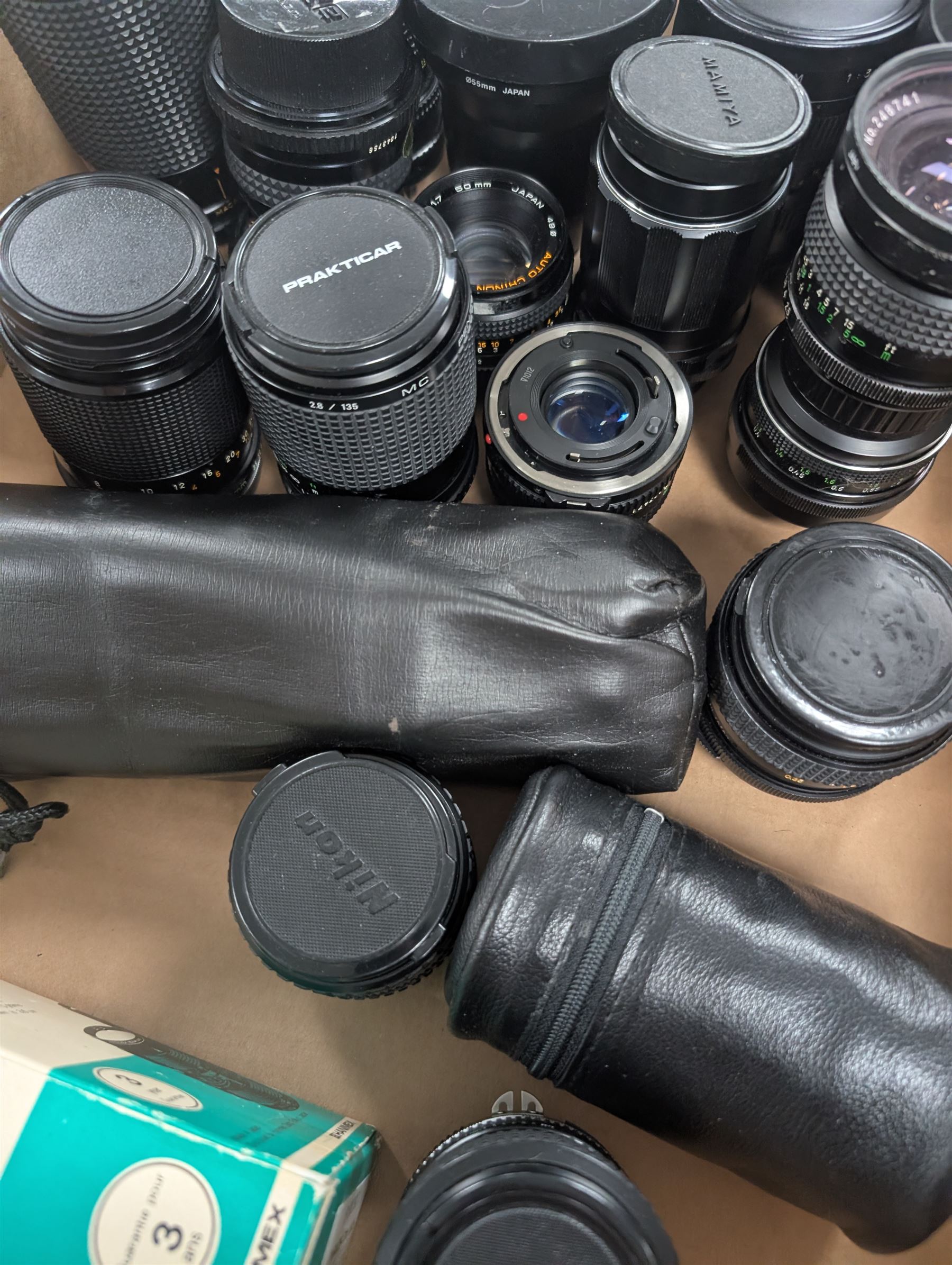 Collection of camera lenses, including and Olympus, Nikon, Sirius, Mamiya, Pentacon, Hanimex etc and Tamron adapters