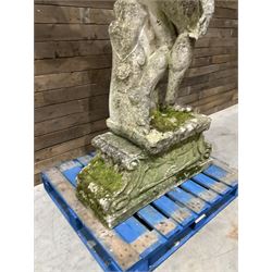 Life-size weathered cast stone Greek Discus Athlete, seated on rectangular slab raised on associated architectural plinth