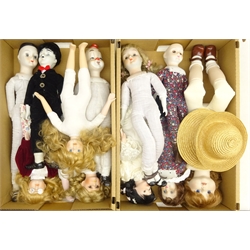  Collection of modern bisque head dolls including Charlie Chaplin, in two boxes  