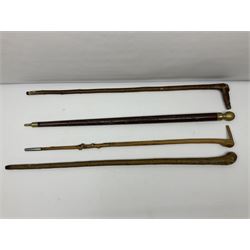 Four wooden walking canes, including a carved mahogany snooker cue example, tallest H86cm