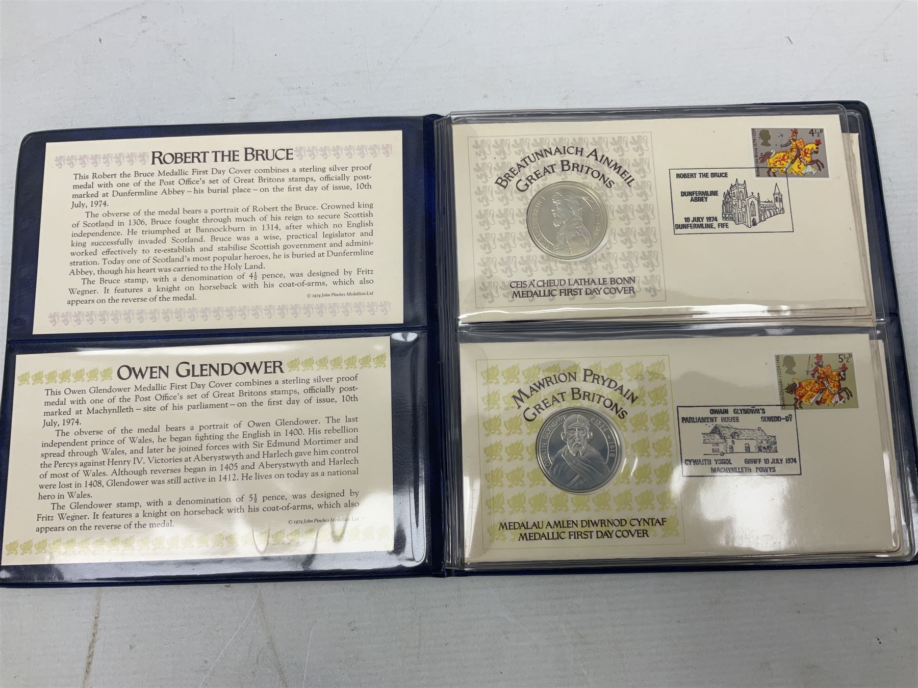 The Royal Mint United Kingdom 1984 brilliant uncirculated coin collection, 1997 and 2001 commemorative crown coins, 1997 old round one pound, all in card folders and four sterling silver medallic first day covers from the 'Great Britons' collection housed in a blue folder