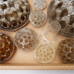 Ten glass pique fleurs or flower holders, in one box 
Provenance: from the Kirkham Hall estate. 
