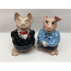 Set of five Wade NatWest money boxes, comprising father, mother, boy, girl and baby