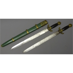  Chinese double sword Qing Dynasty each with 42cm diamond section steel blade, cast brass mounts and horn grip in shagreen covered scabbard with ornate brass mounts 63cm overall  