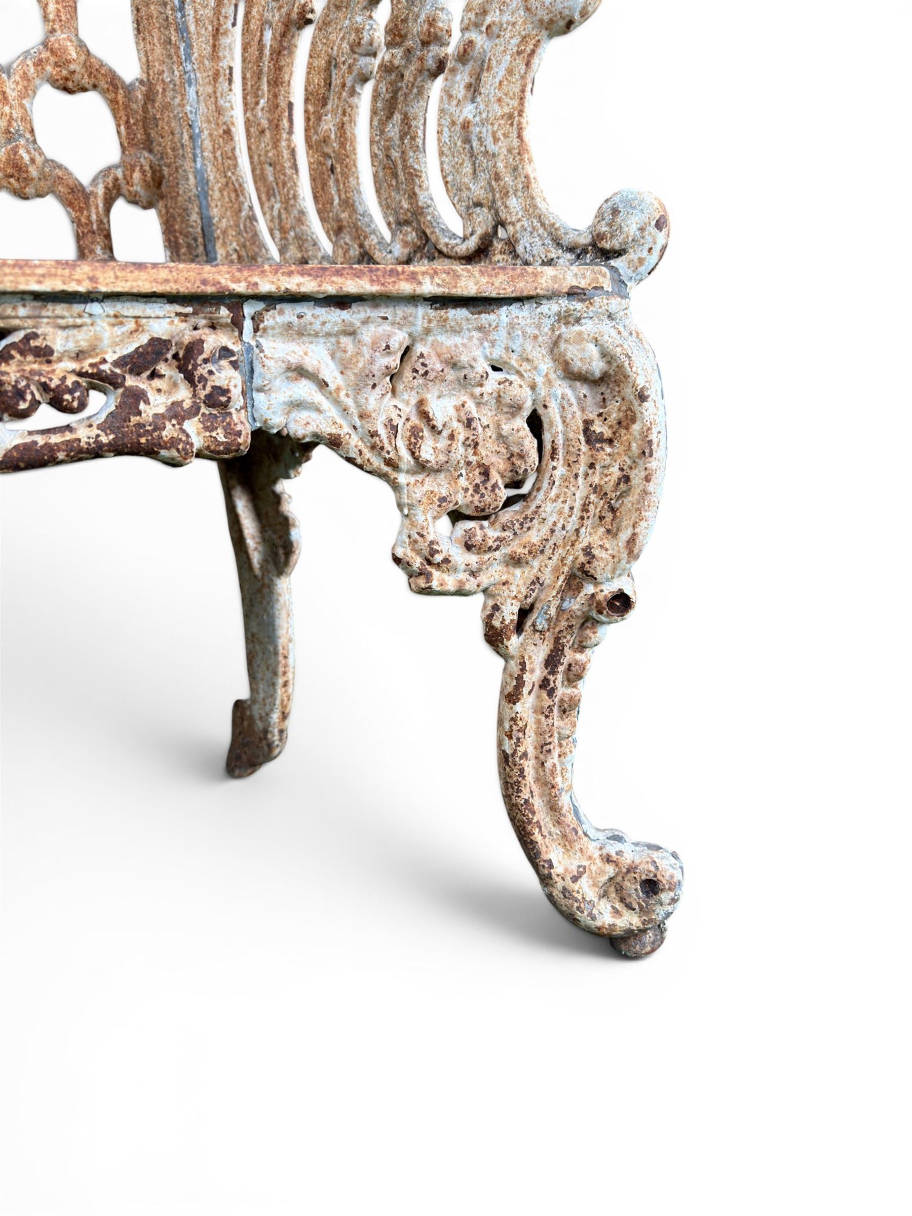 Victorian revival Carron Foundry design heavy cast iron two seat garden bench, scrolled arms with pierced lattice seat, finished in antique white paint