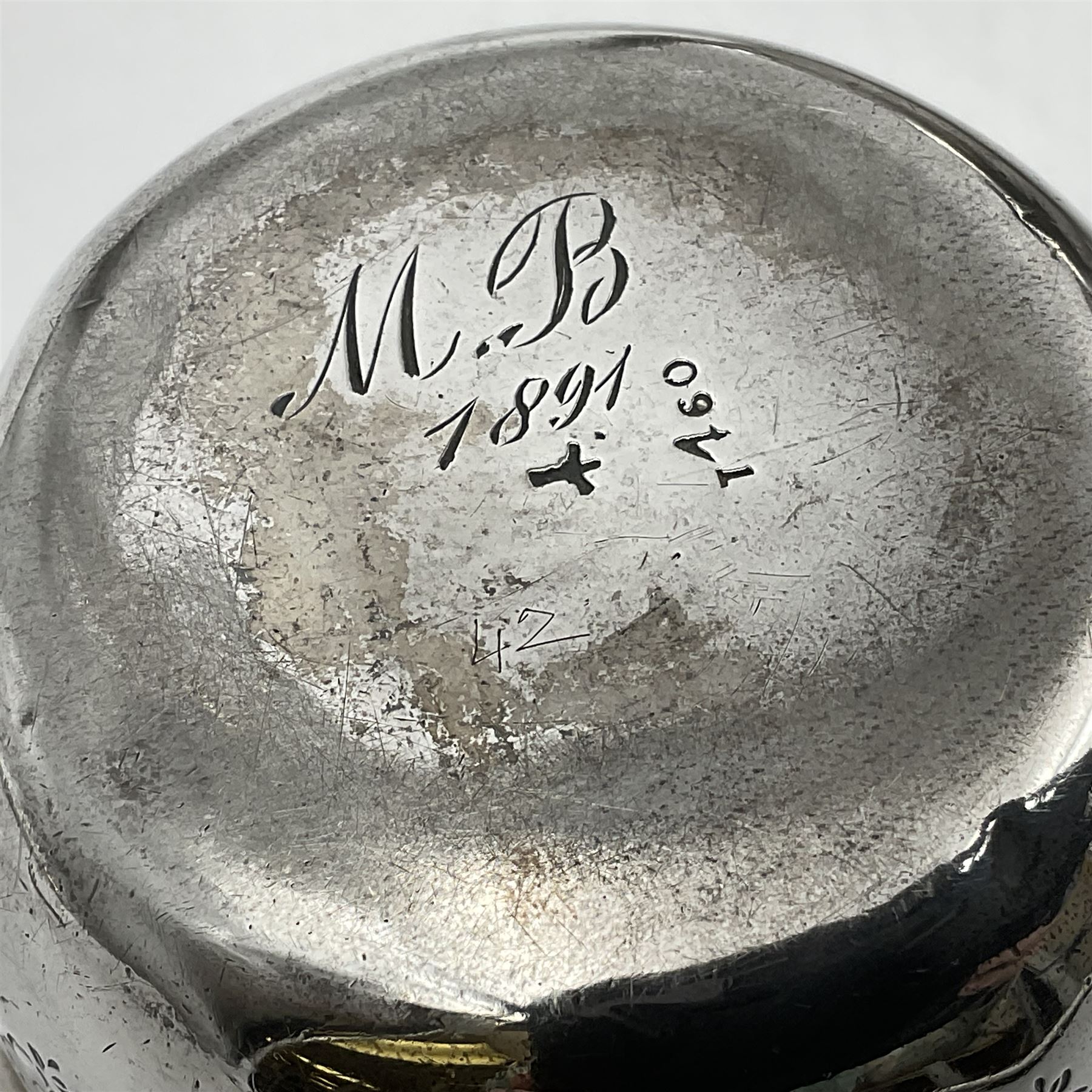 Late Victorian silver bachelors three piece tea service, comprising bullet shaped teapot, open sucrier and milk jug, each engraved with monogram surrounded by birds upon and amidst a blossoming vine, the teapot with scroll capped curved wooden handle and wooden finial to cover, hallmarked Wakely & Wheeler, London 1890, teapot including handle H12cm, sucrier H5.5cm 