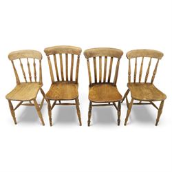 Eight Victorian farmhouse chairs in elm and beech, spindle-back frames with moulded seats, on turned and plain supports