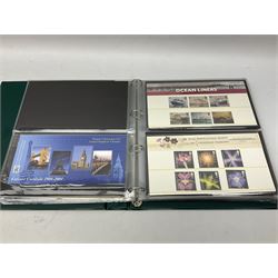 Queen Elizabeth II mint decimal stamps, mostly in presentation packs, face value of usable postage approximately 250 GBP, housed in two ring binder folders