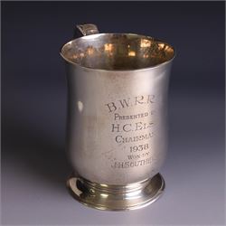 1930s silver tankard, of typical bellied form upon a circular base with ribbed handle, the...