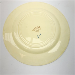 A Clarice Cliff Bizarre by Wilkinson Limited dinner plate, trio and cup in the Sunshine pattern. (5).