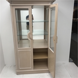 French style limed oak finish display cabinet, two doors enclosing two glazed shelves, with illuminated interior, plinth base, W106cm, H180cm, D50cm