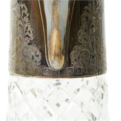 Pair of cut glass claret jugs with engraved silver mounts H32cm Birmingham 1971 Maker Charles s Green & Co Ltd