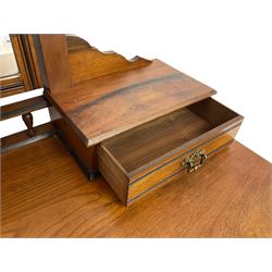 Late Victorian Aesthetic Movement walnut and inlaid ebony dressing table, swing mirror back with shell carving and spindle support rail, fitted with two trinket drawers and single frieze drawer, raised on ring turned supports with castors