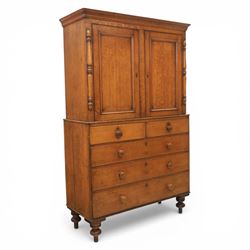 Late 19th century country oak cupboard on chest, cornice top above twin recessed panel doo...