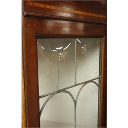  Edwardian inlaid mahogany display cabinet, raised back, shaped front, lead glazing, single door enclosing adjustable shelf, tapering supports, W120cm, H196cm, D37cm  