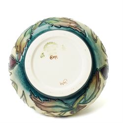 Moorcroft Hellebore pattern vase, of squat baluster form, with impressed and painted marks to base, in original box, H10.5cm 